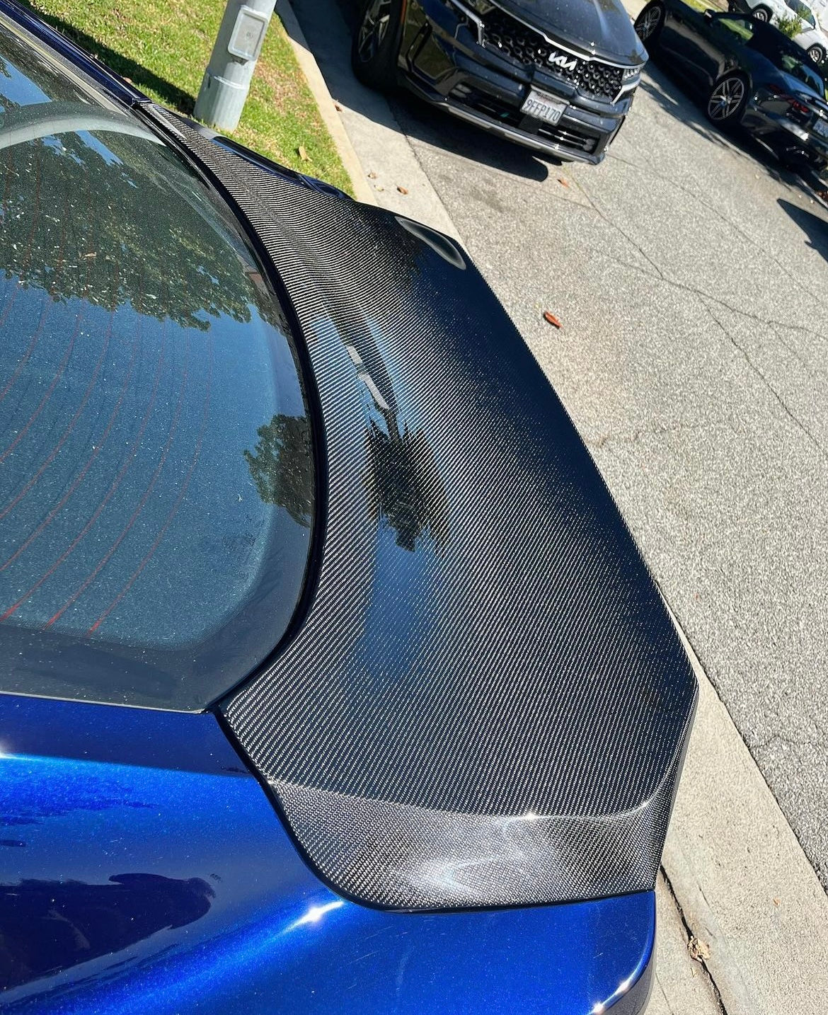 2015-2023 MUSTANG DOUBLE SIDED CARBON FIBER TYPE-ST DECKLID WITH INTEGRATED SPOILER